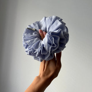 Gloria is the bushiest and the most distinctive oversized bun scrunchie you’ll ever wear!! Each item is handcrafted mostly from dead stock textiles and fabric scraps sourced & designed in Europe by our creative team.